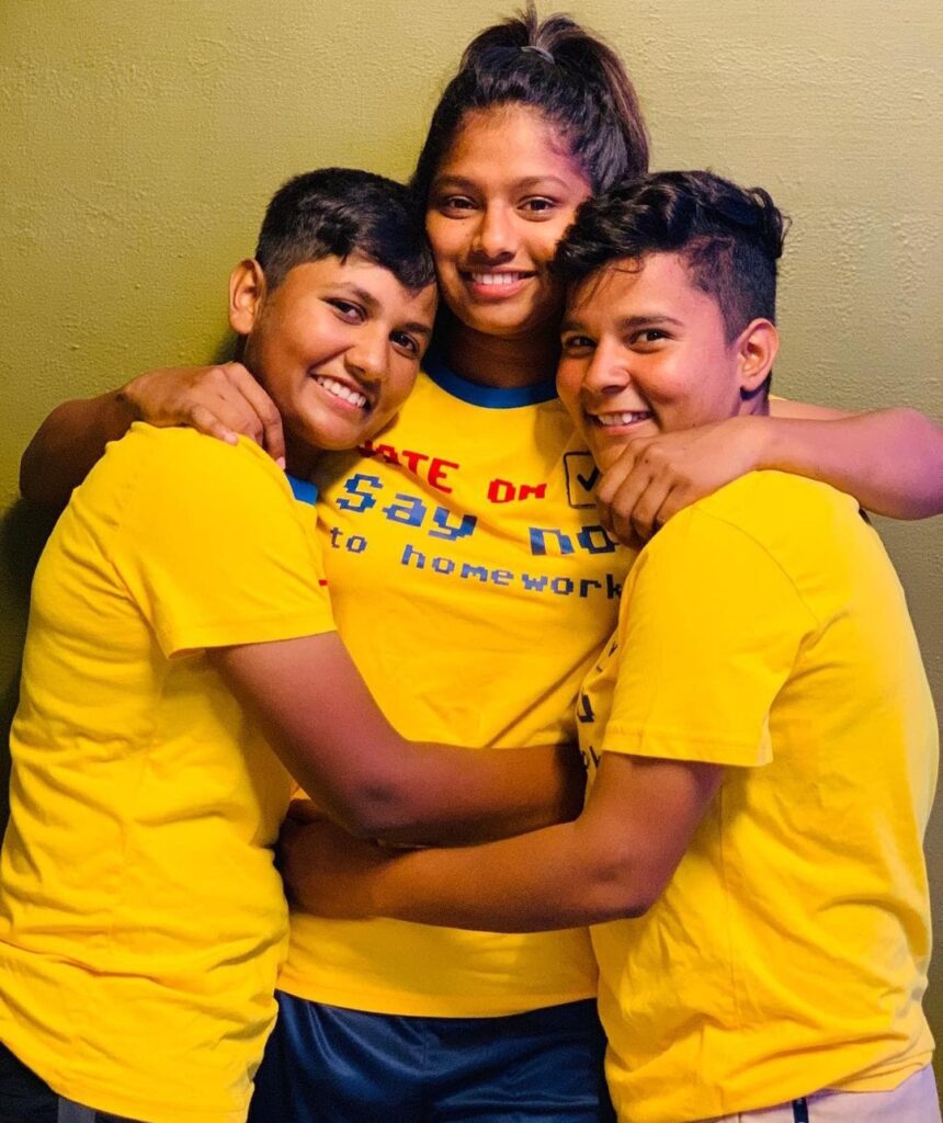 Kanika Ahuja with her siblings 